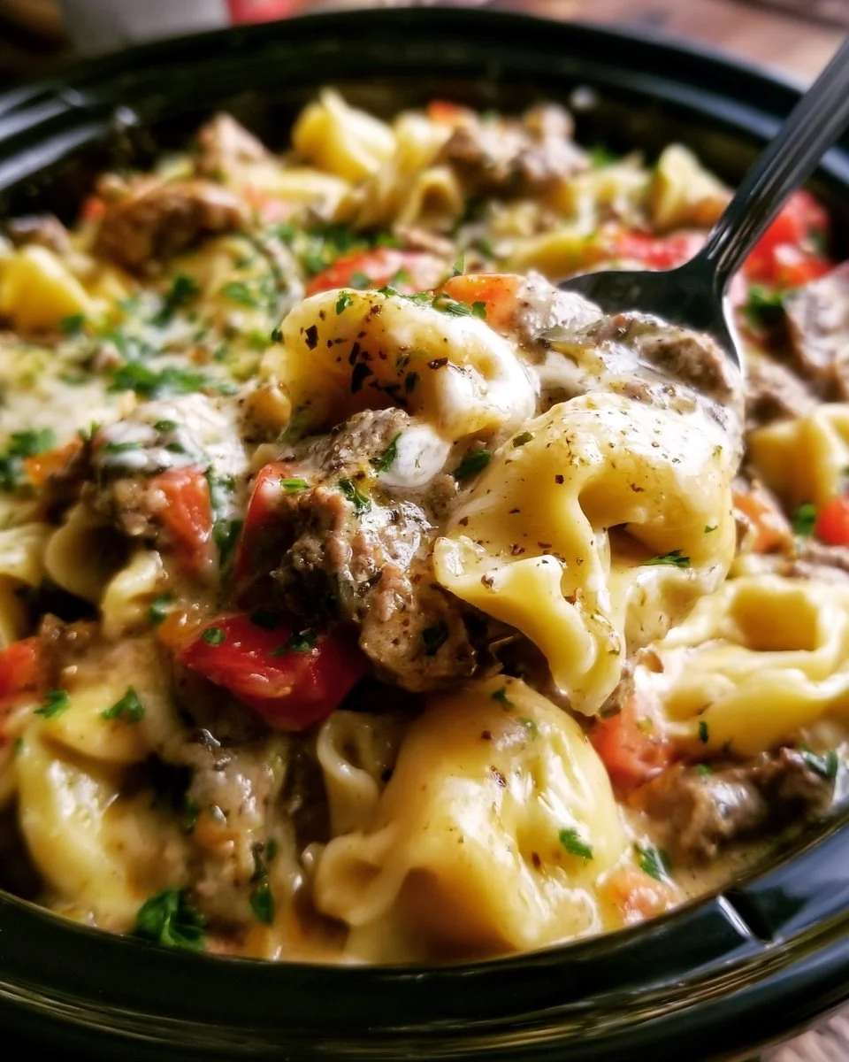 Delicious Crock Pot Cheesesteak Tortellini served in a bowl