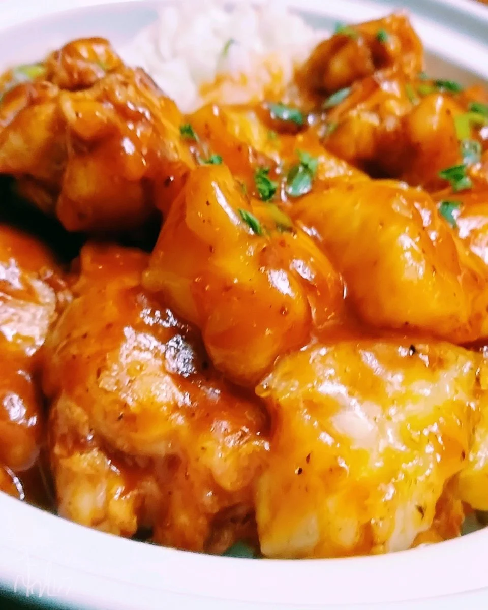 Delicious Crock Pot Sweet Pineapple Chicken served with rice.