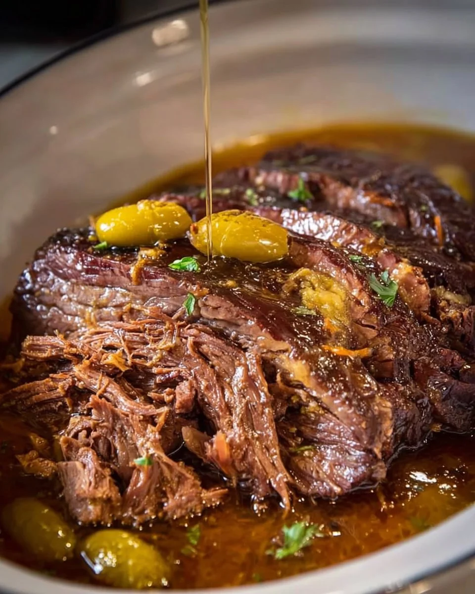 Slow cooker Mississippi pot roast with spices and peppers cooked to perfection