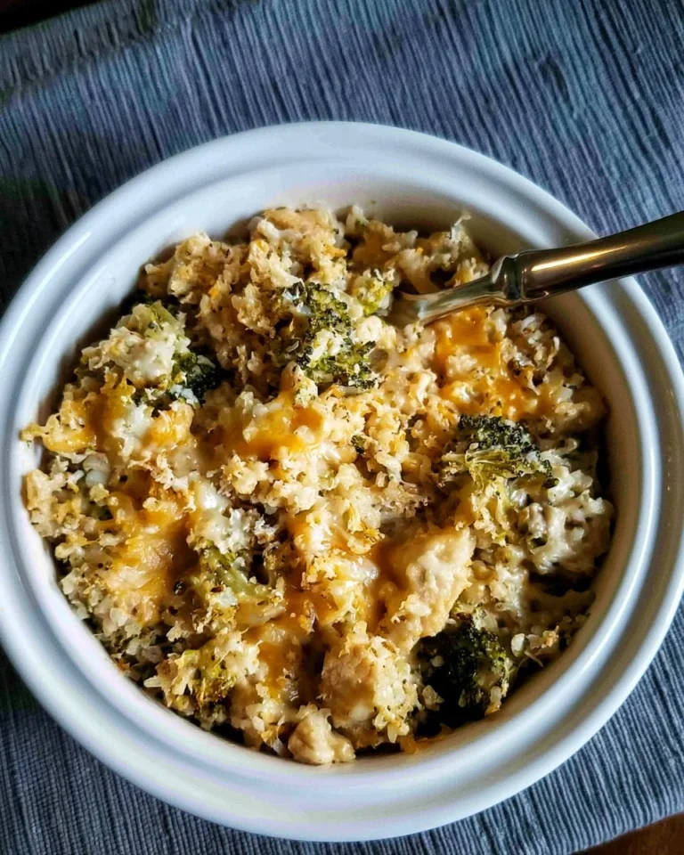 Crockpot cheesy chicken broccoli and rice casserole served in a bowl.