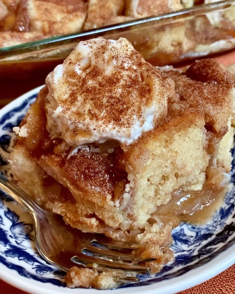 Delicious Snickerdoodle Dump Cake topped with cinnamon and sugar.