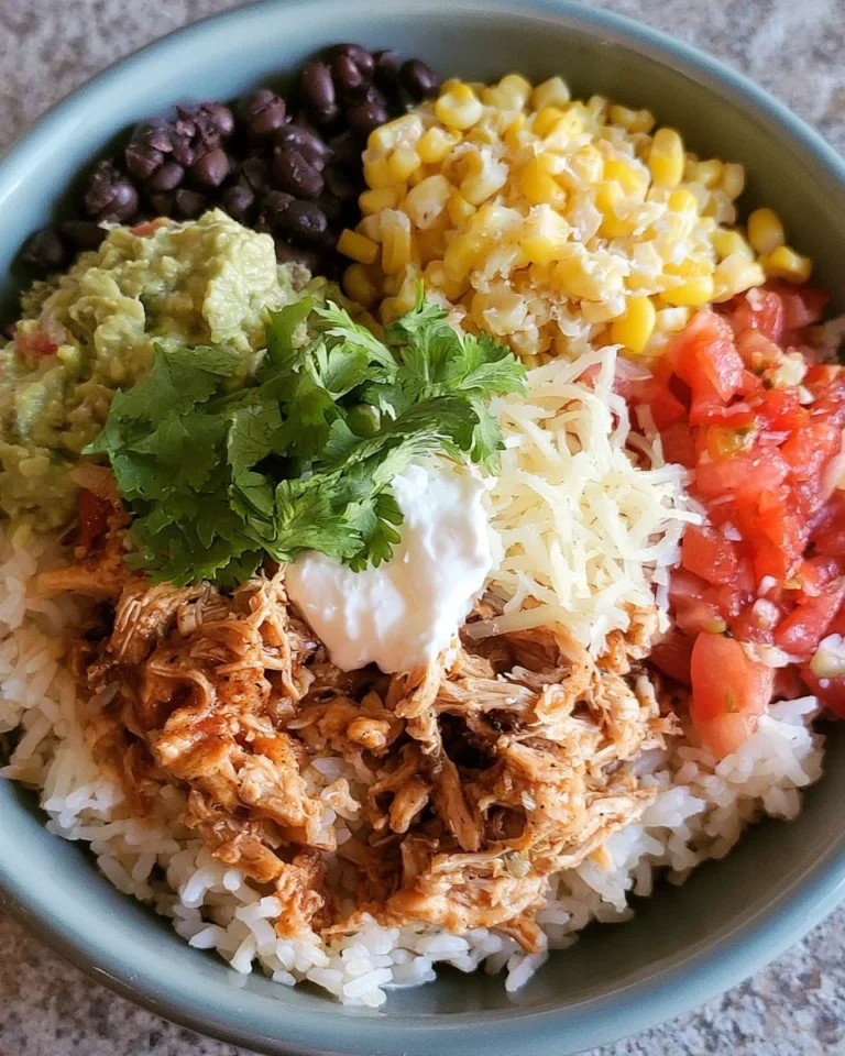 Delicious crockpot burrito bowl with vibrant toppings and ingredients